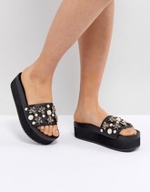 Steve Madden - Adorn - Slider flatform nere con decorazione di insetti - Nero