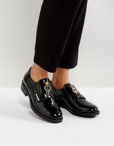 Love Moschino - Scarpe piatte con zip davanti - Nero