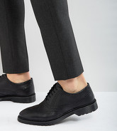 ASOS - Scarpe brogue a pianta larga in pelle nera con suola a coste - Nero