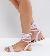 ASOS - FIONA - Sandali piatti a pianta larga con allacciatura sulla gamba - Viola