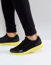 ASOS - Sneakers nere con suola fluo - Nero
